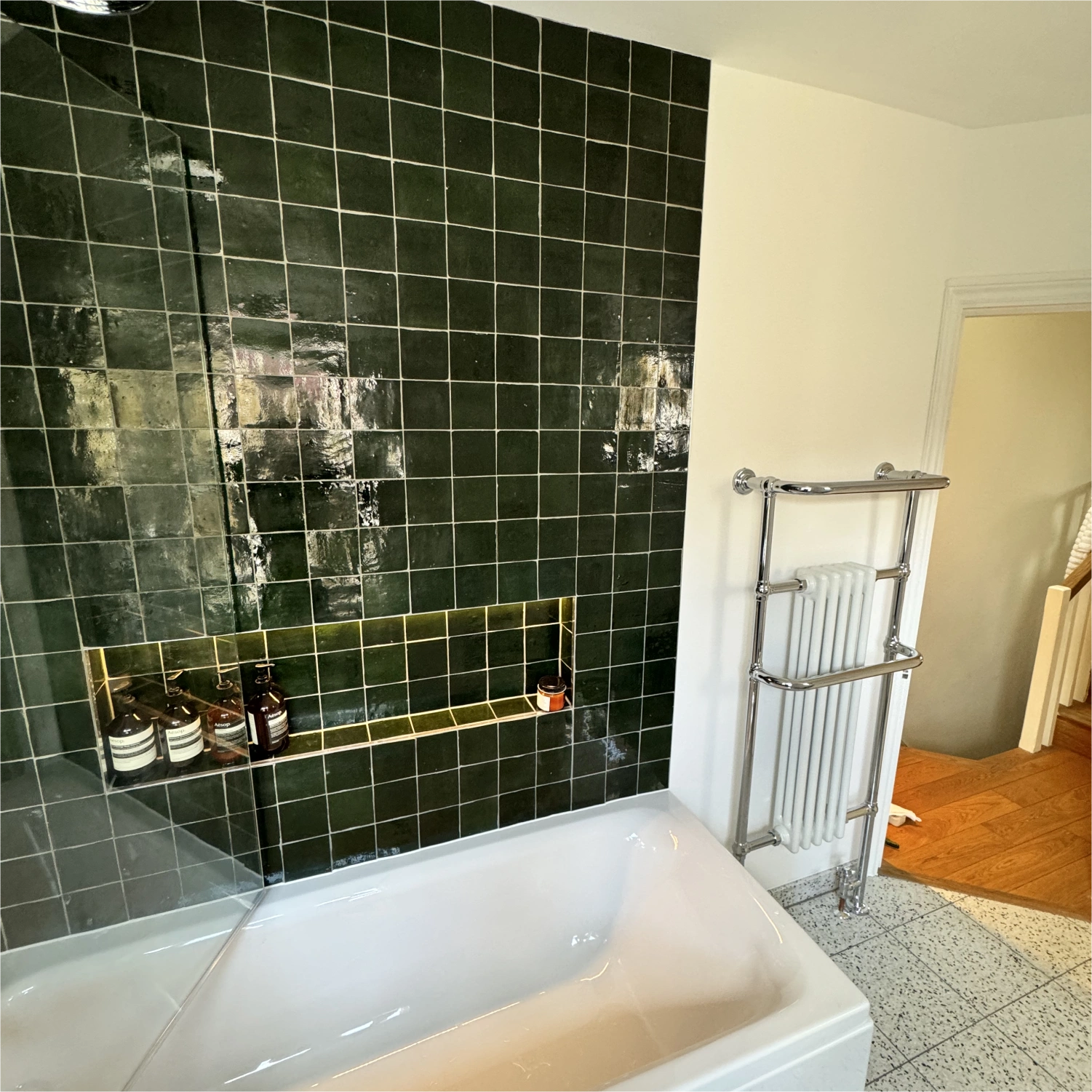 Project photo showing team working on bathroom fit