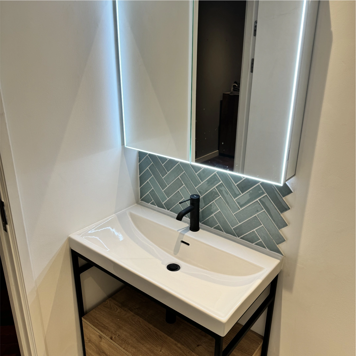 Supplier logo displayed on branded showroom image