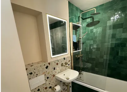 Mirror and basin installation from finished bathroom