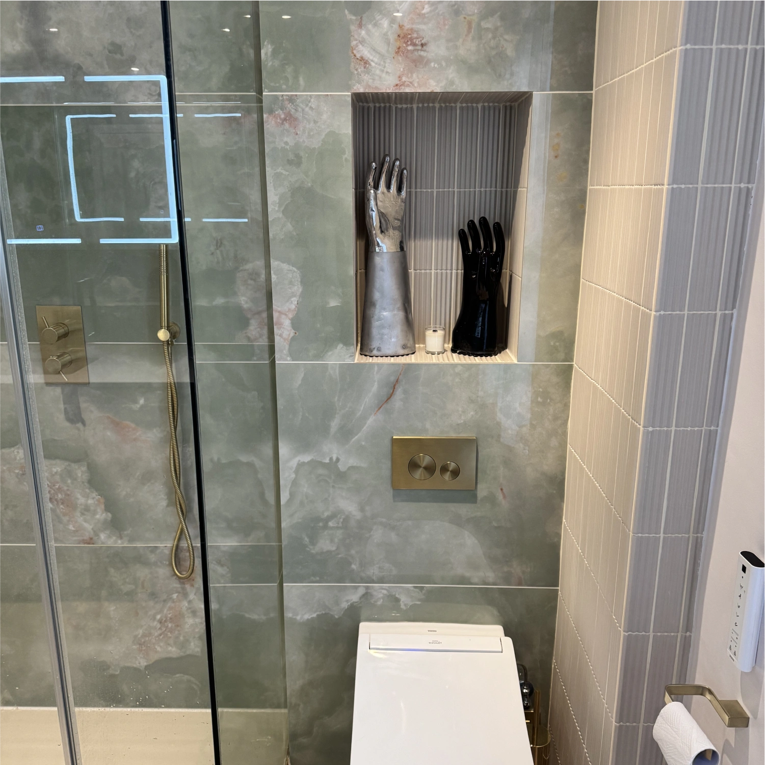 White tiled bathroom project showing final fitting result